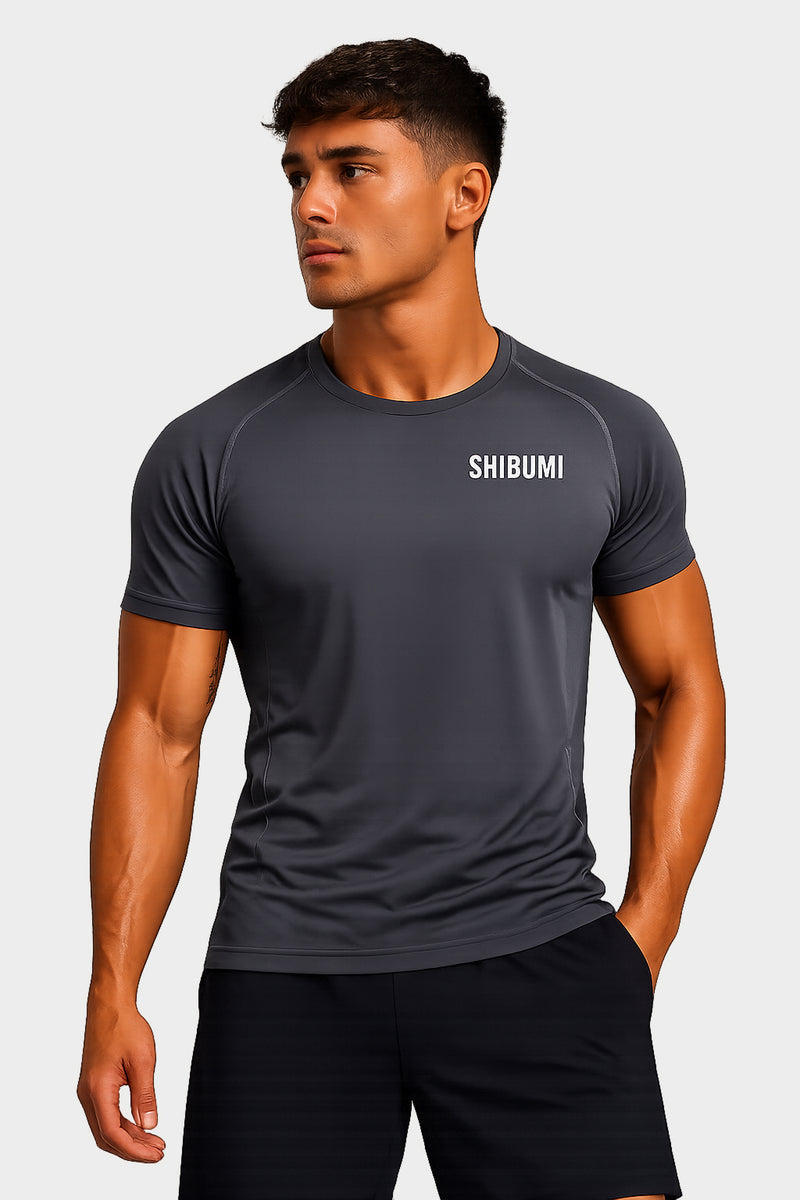 Man wearing a black t-shirt with 'SHOSHIN' logo on a white background