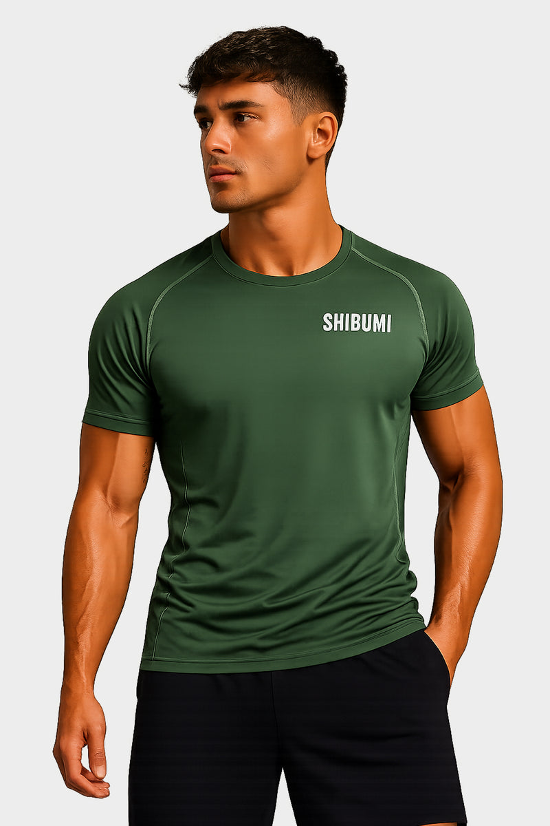 Man wearing a green athletic shirt with 'SHOSHIN' branding on a light gray background