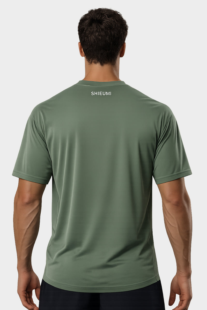 Person wearing a green athletic shirt with 'SHIEUMI' branding on the back.
